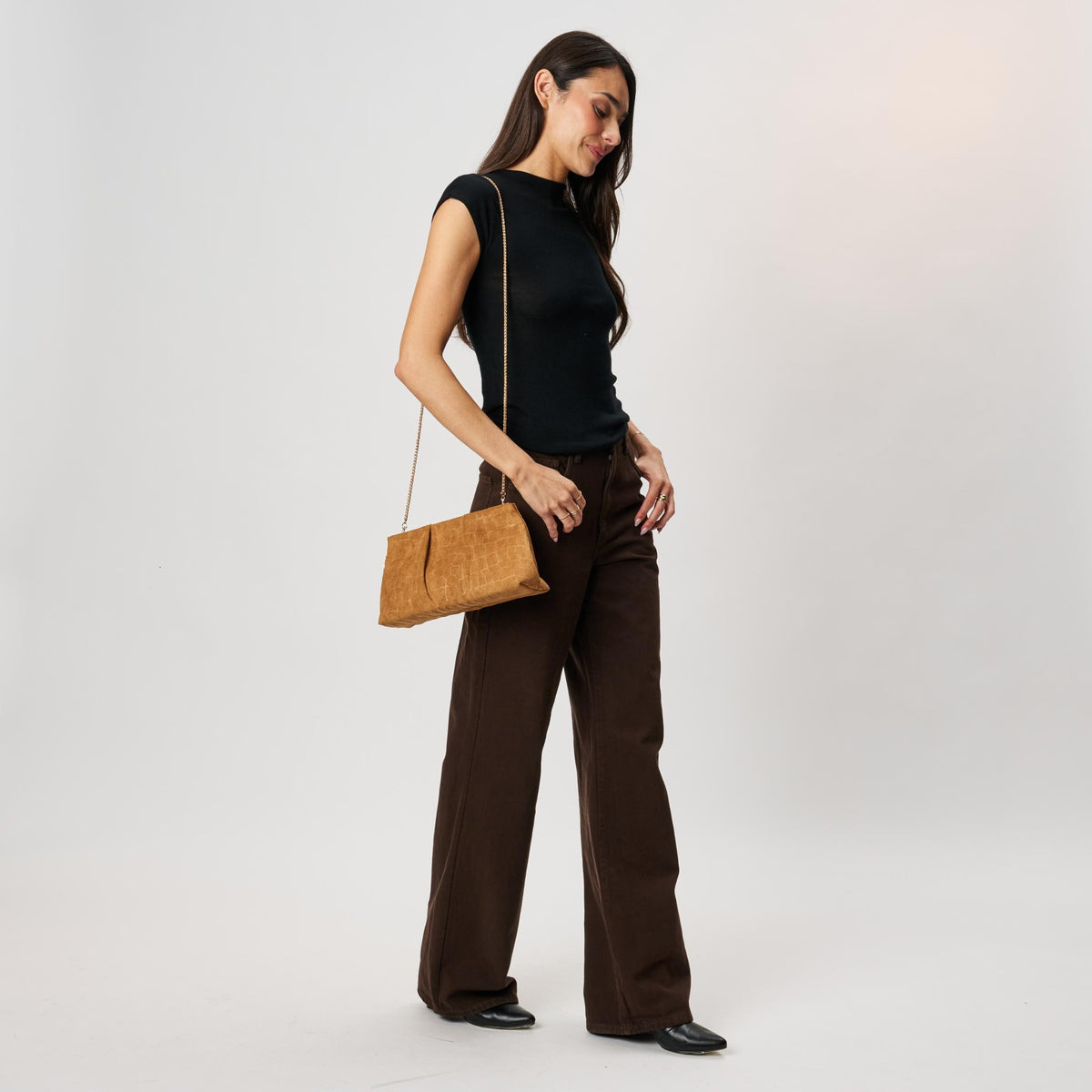 Woman wearing Tan Moda Luxe Elva Croco Clutch 842017142287 View 4 | Tan