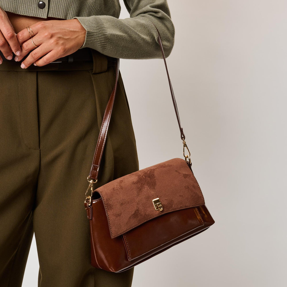 Woman wearing Chocolate Moda Luxe Aly Crossbody 842017143048 View 3 | Chocolate