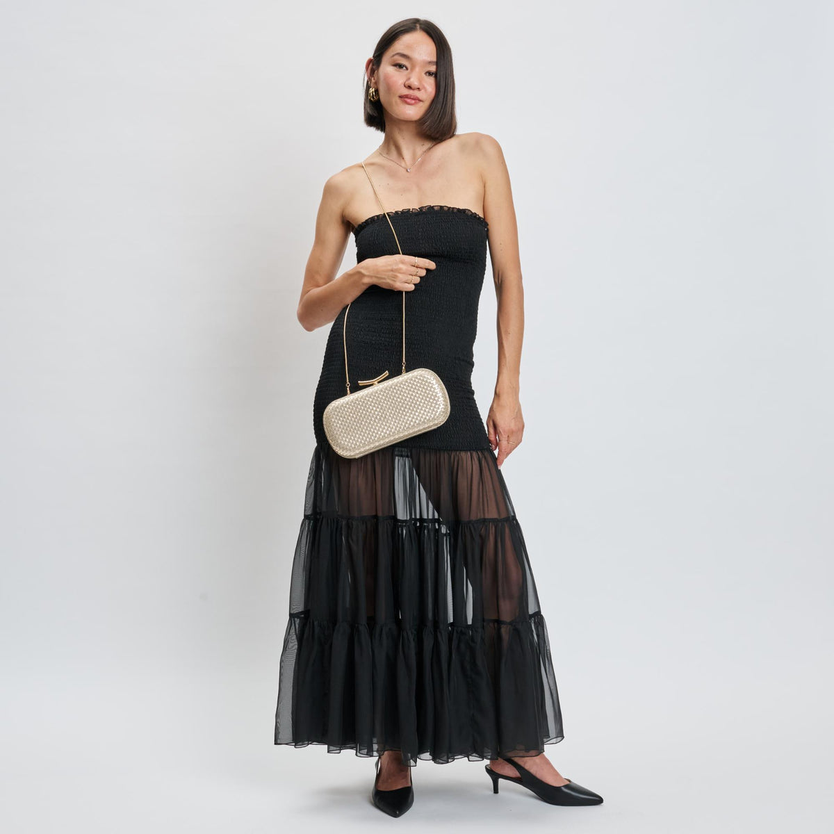 Woman wearing Gold Moda Luxe Victoria Evening Bag 842017139461 View 2 | Gold