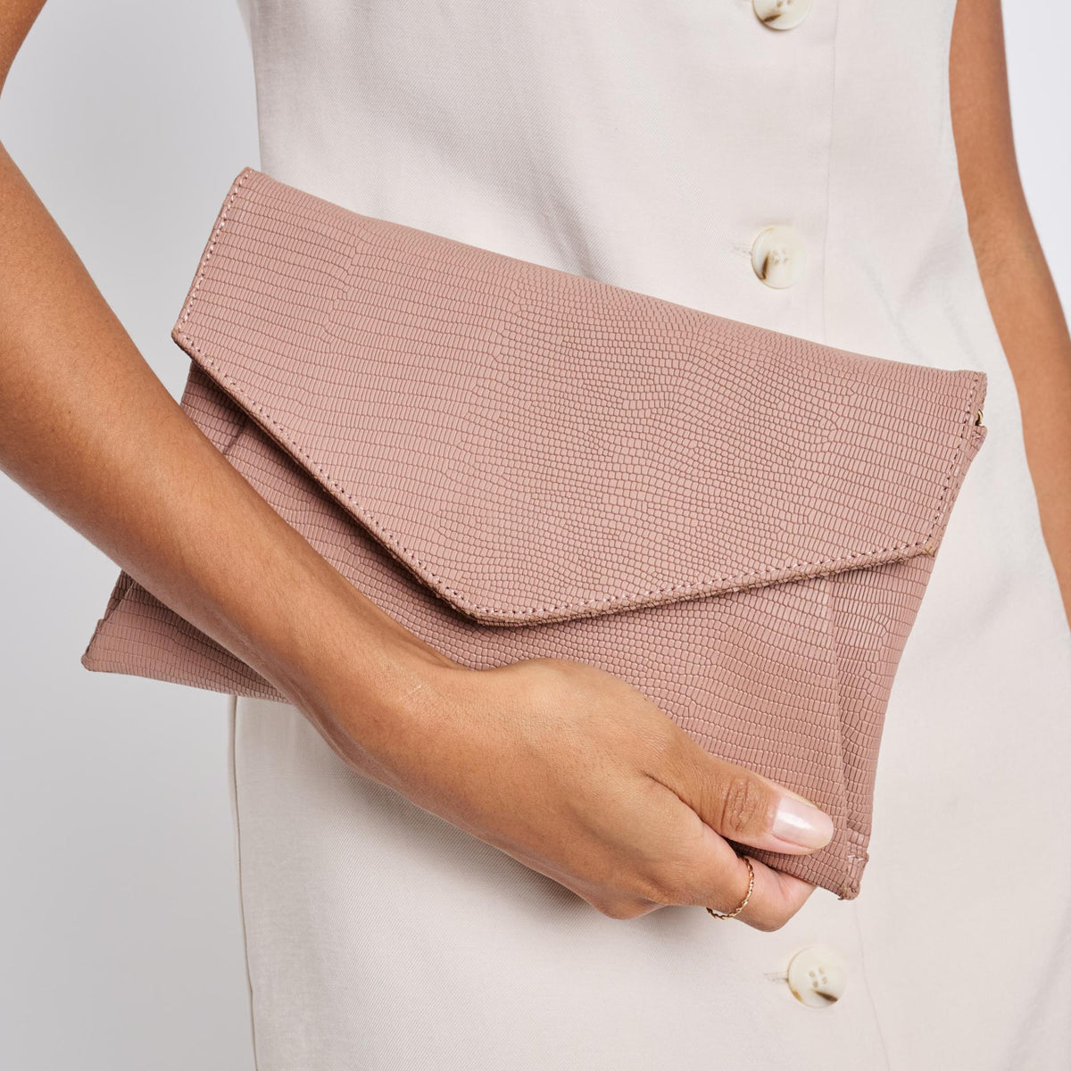 Woman wearing Mauve Sol and Selene Cara Clutch 842017118206 View 1 | Mauve
