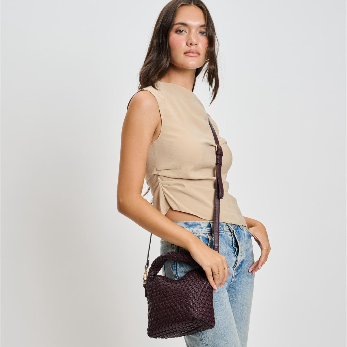 Woman wearing Espresso Moda Luxe Jessamine Crossbody 842017136217 View 2 | Espresso