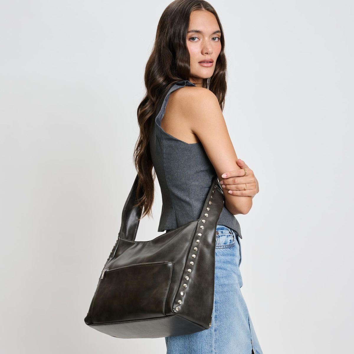 Woman wearing Gunmetal Moda Luxe Electra Crossbody 842017136170 View 3 | Gunmetal