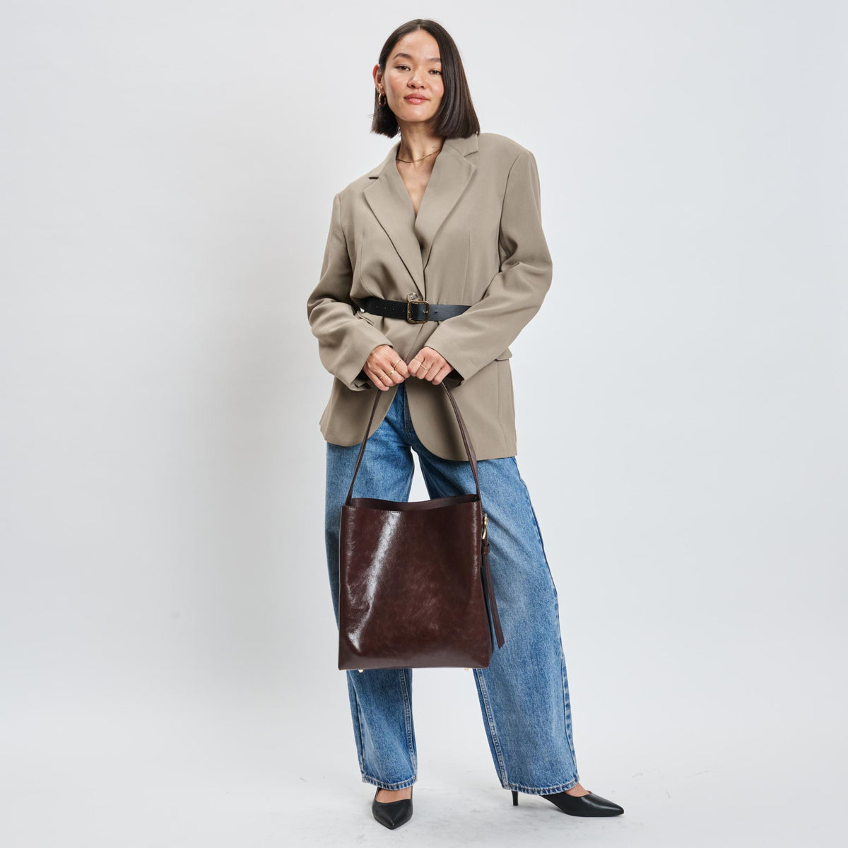 Woman wearing Chocolate Sol and Selene Brooke Bucket 842017139546 View 4 | Chocolate