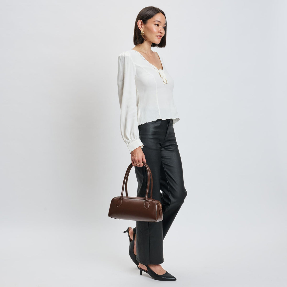 Woman wearing Espresso Moda Luxe Betty Shoulder Bag 842017139430 View 3 | Espresso