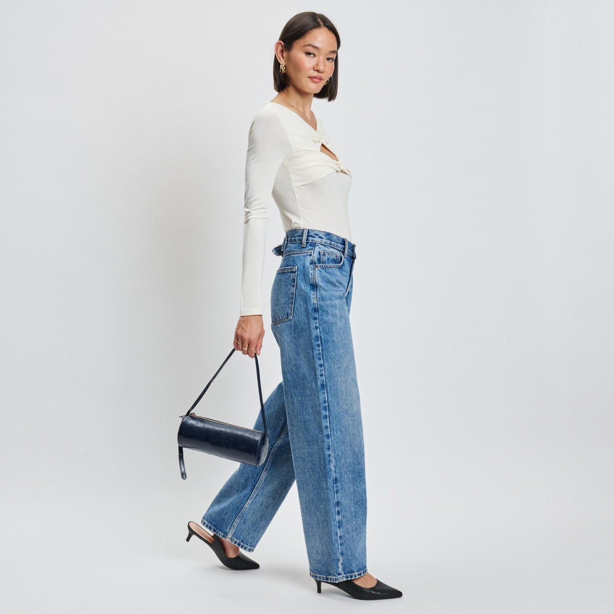 Woman wearing Midnight Sol and Selene Mila Shoulder Bag 842017139300 View 3 | Midnight