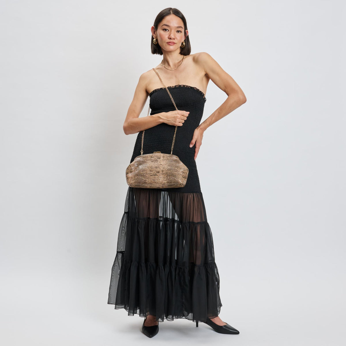 Woman wearing Brown Moda Luxe Camille Clutch 842017139201 View 4 | Brown