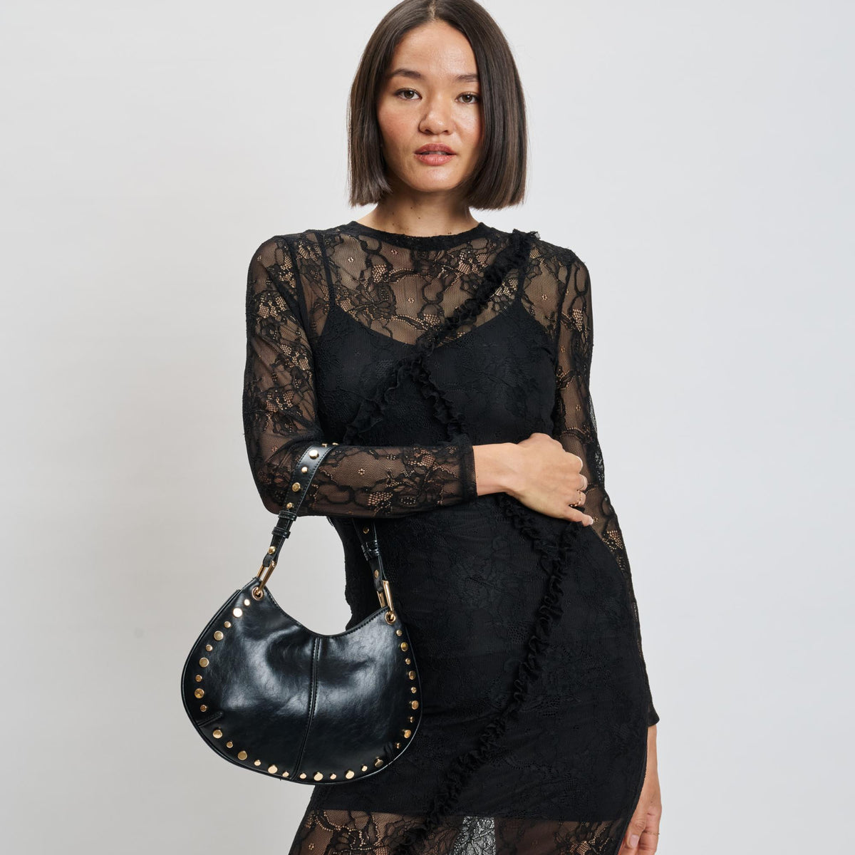 Woman wearing Black Sol and Selene Nova Crossbody 842017139638 View 2 | Black