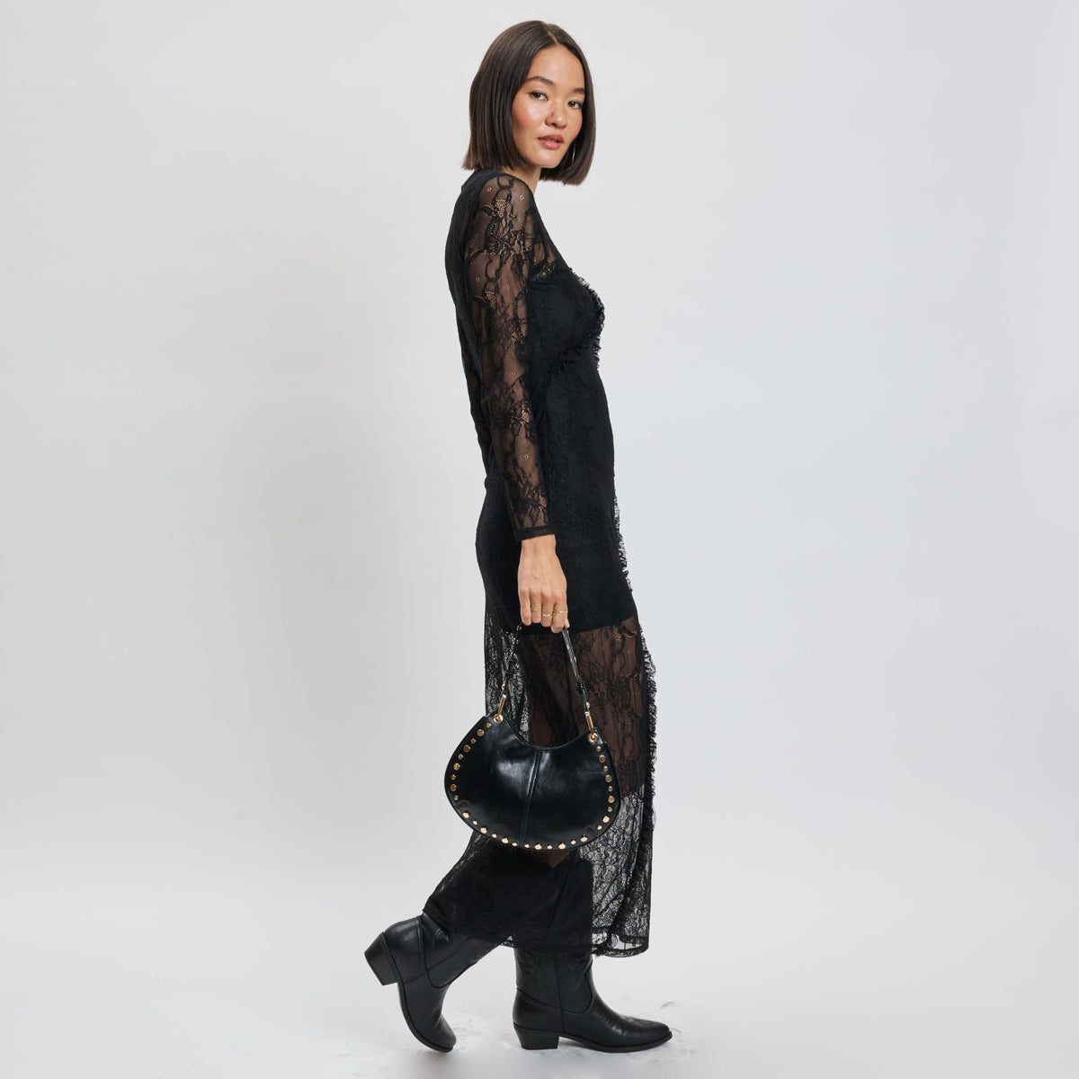 Woman wearing Black Sol and Selene Nova Crossbody 842017139638 View 3 | Black