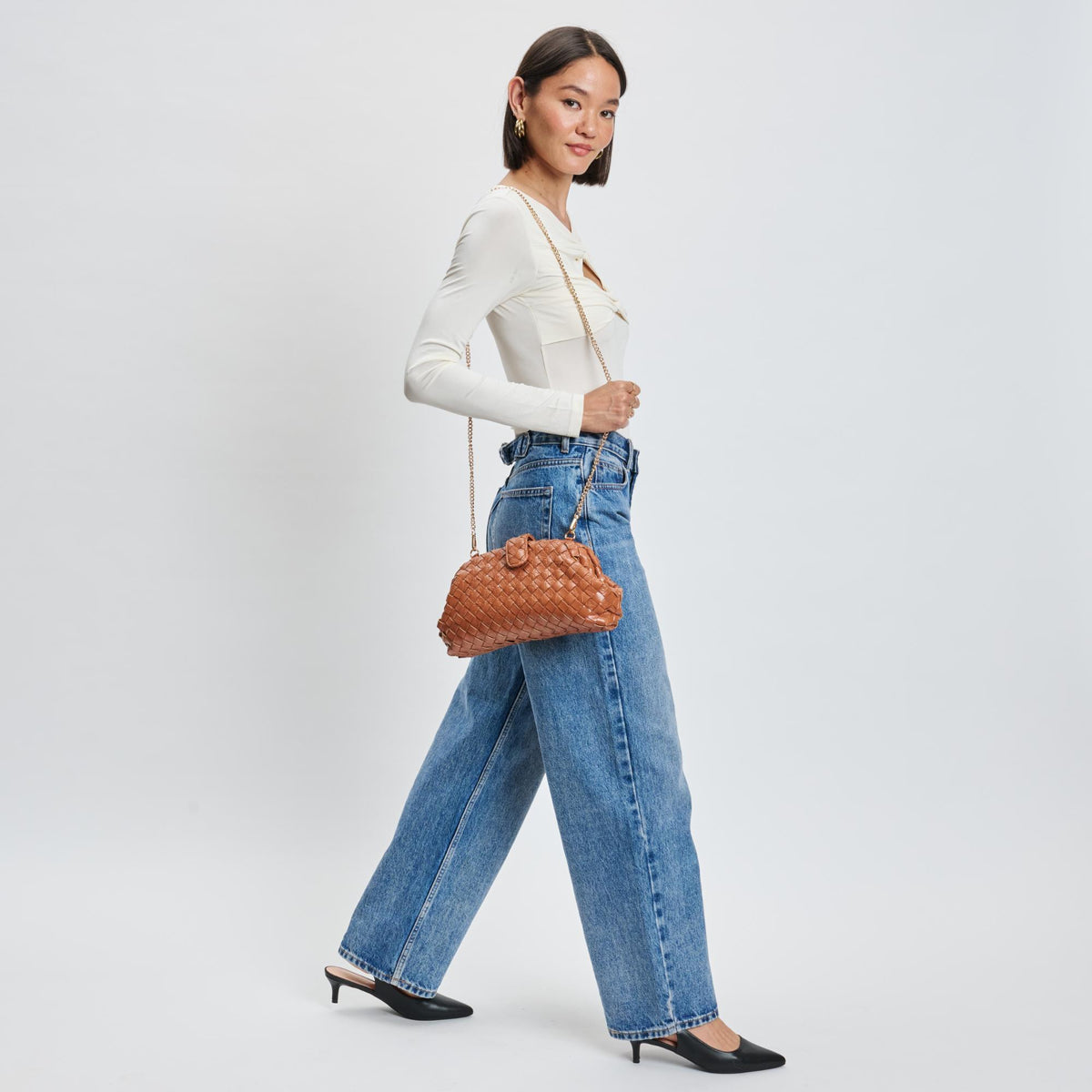 Woman wearing Tan Moda Luxe GiGi Crossbody 842017139614 View 2 | Tan