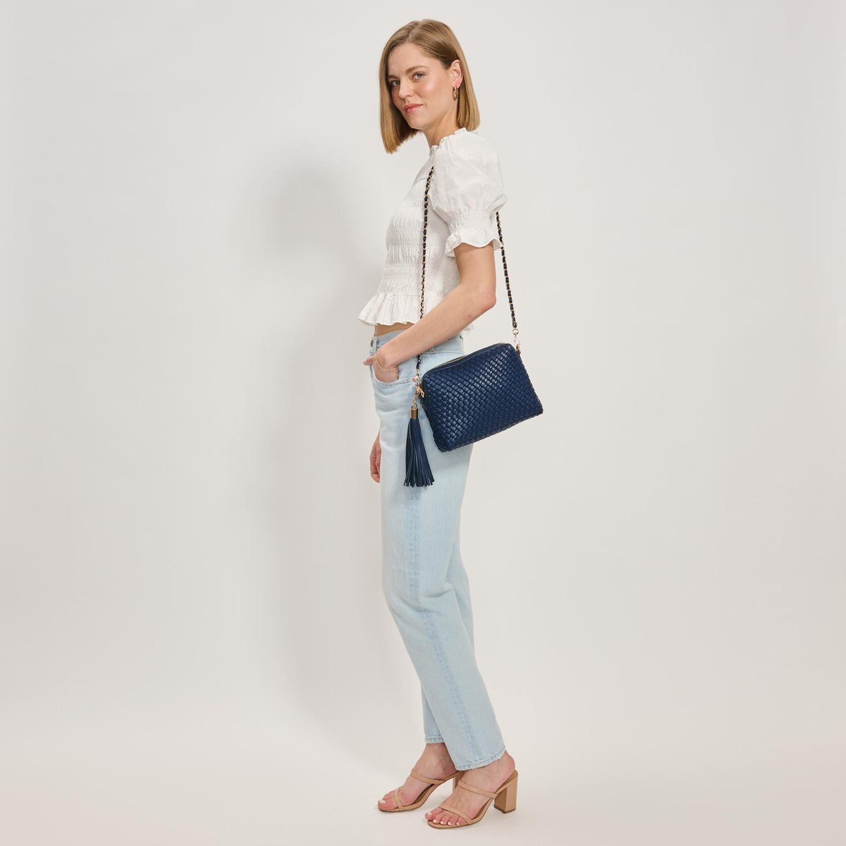 Woman wearing Navy Moda Luxe Roxana Crossbody 842017137467 View 2 | Navy