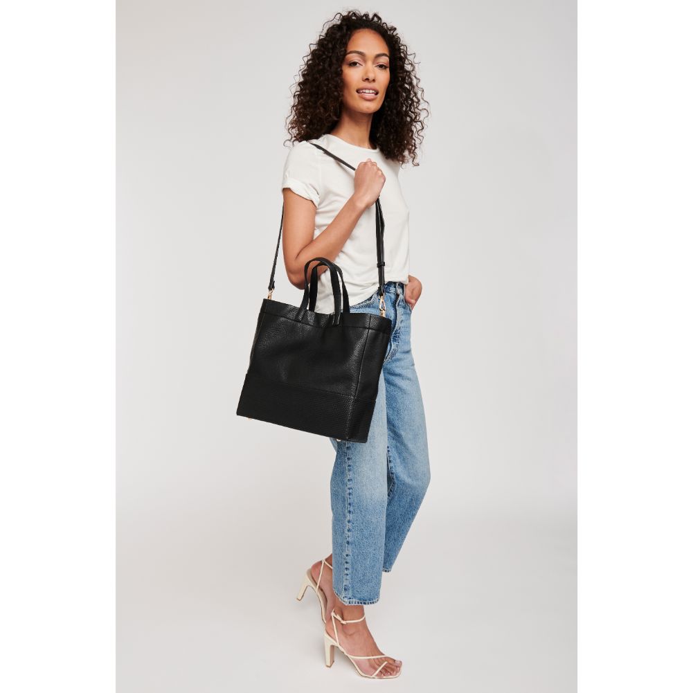 Woman wearing Black Moda Luxe Ingrid Tote 842017125006 View 3 | Black