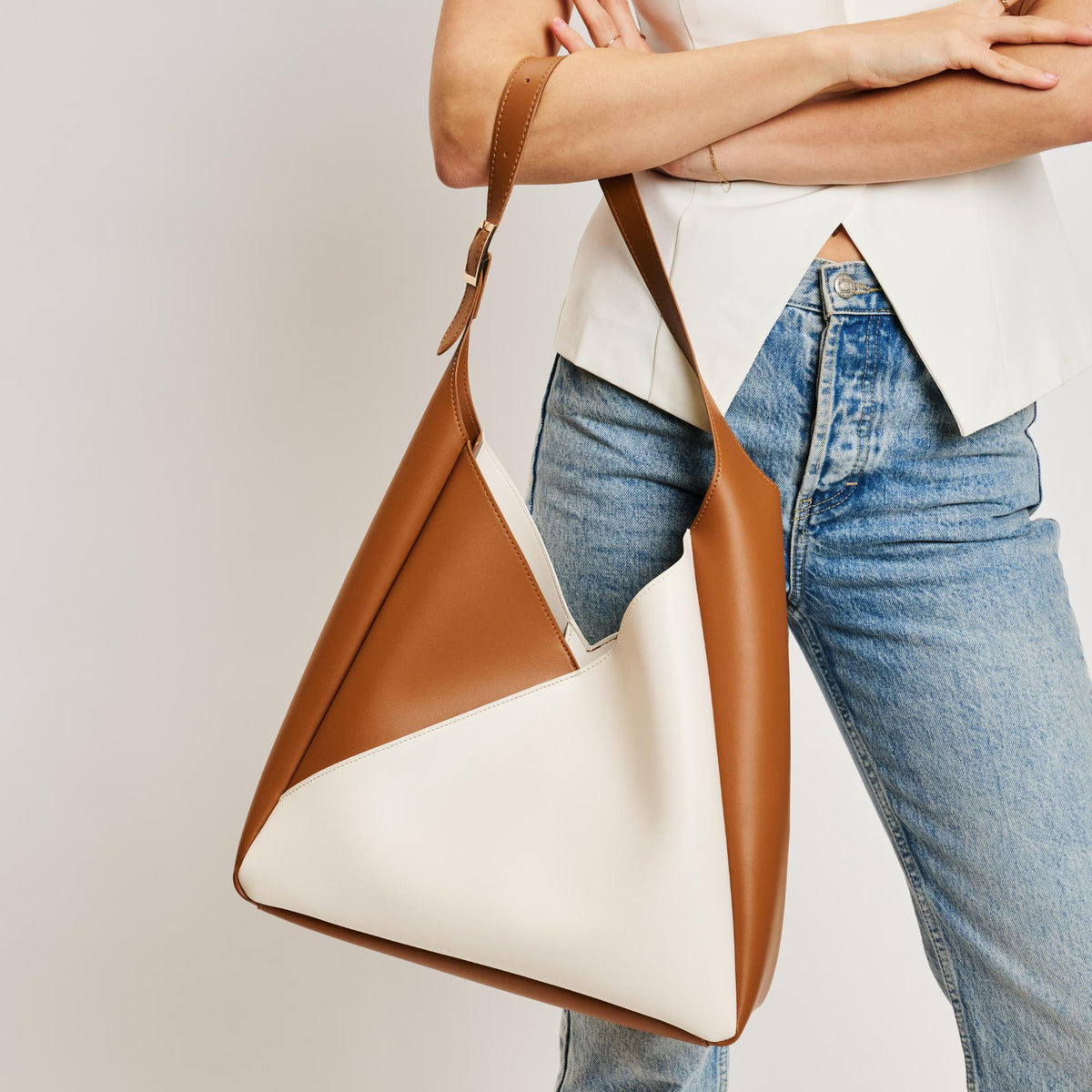 Woman wearing Ivory Tan Sol and Selene Frankie Hobo 842017138532 View 4 | Ivory Tan