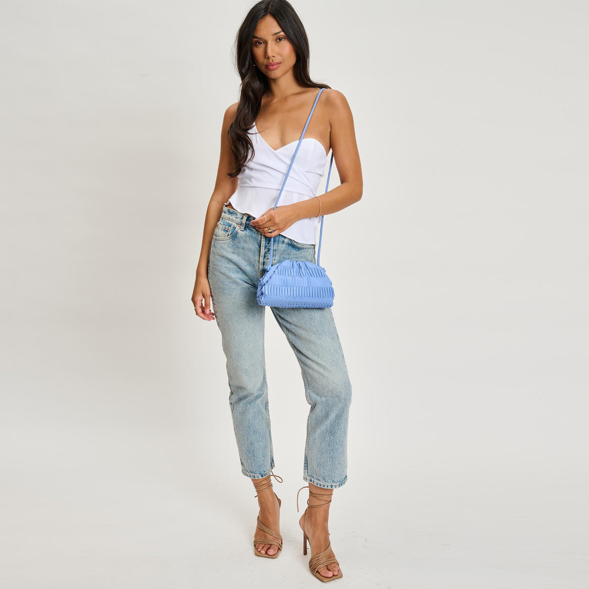 Woman wearing Periwinkle Sol and Selene Divaire Crossbody 842017135531 View 3 | Periwinkle