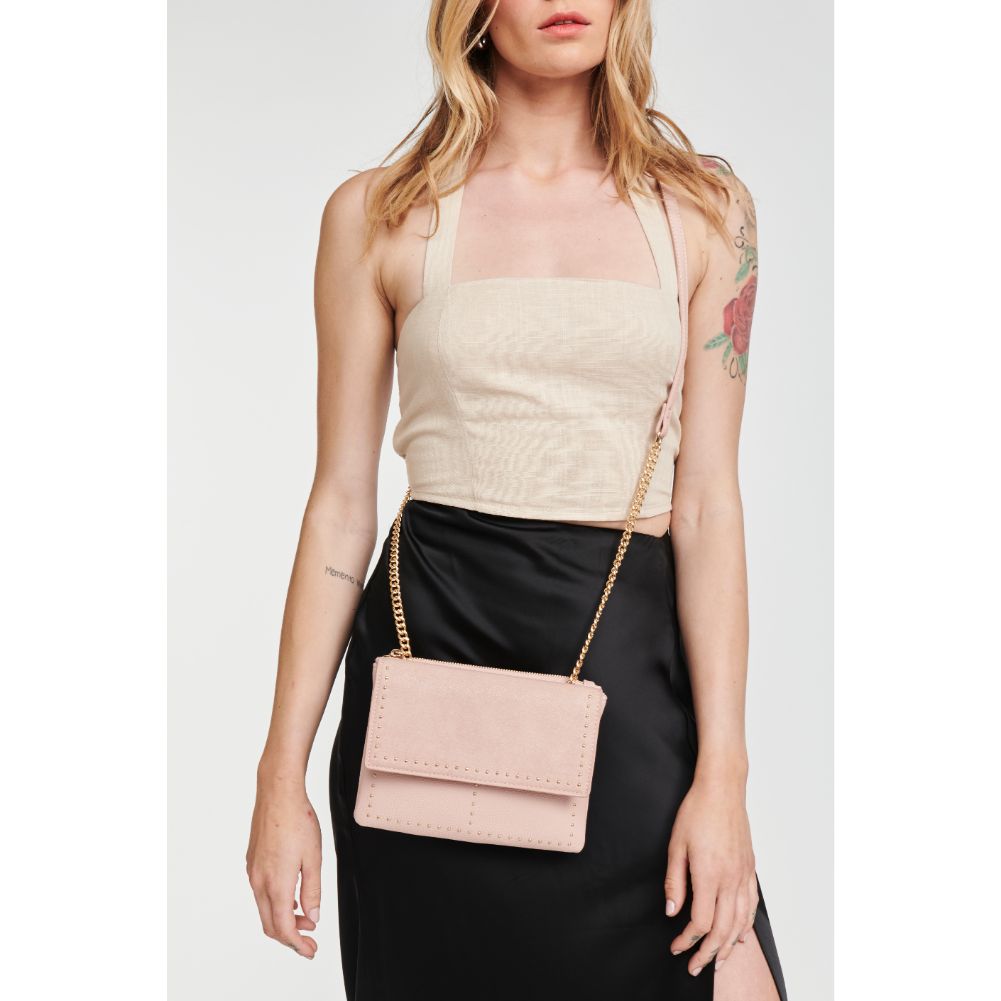 Woman wearing Pink Moda Luxe Fate Crossbody 842017111597 View 1 | Pink