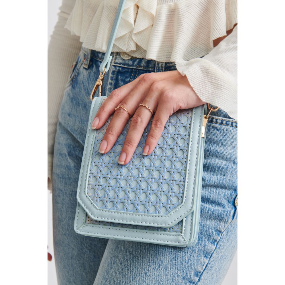 Woman wearing Eggshell Blue Moda Luxe Remi Crossbody 842017124177 View 4 | Eggshell Blue