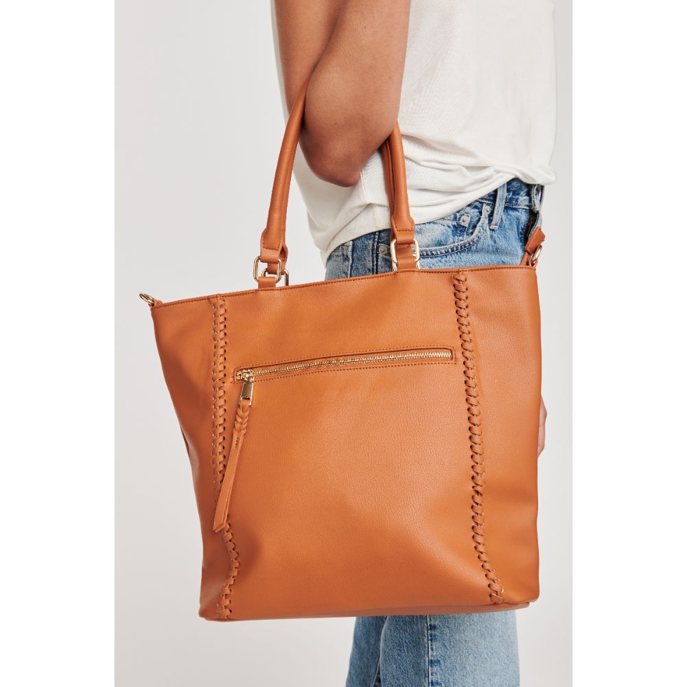 Woman wearing Tan Moda Luxe Jenna Crossbody 842017127406 View 1 | Tan