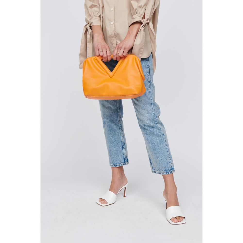 Woman wearing Orange Moda Luxe Kendra Crossbody 842017129981 View 1 | Orange
