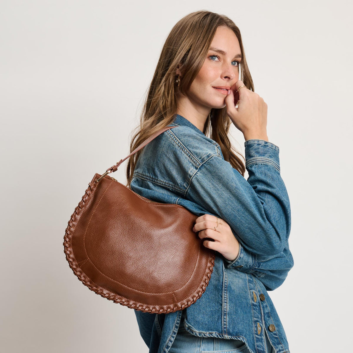 Woman wearing Chocolate Moda Luxe Lita Hobo 842017141082 View 4 | Chocolate