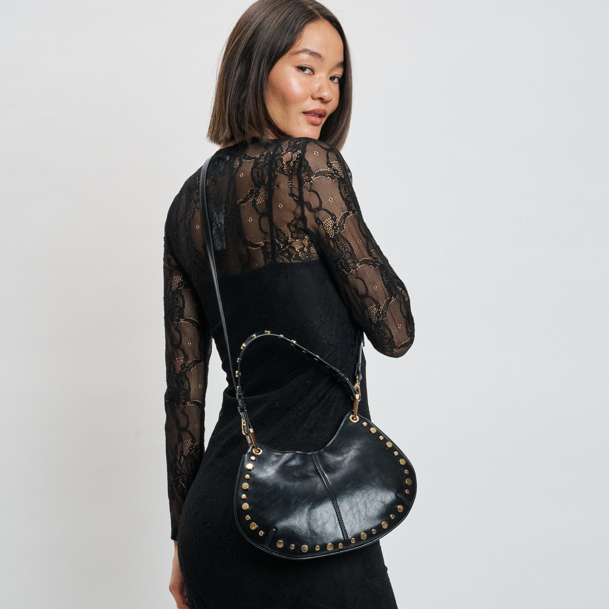 Woman wearing Black Moda Luxe Nova Crossbody 842017139638 View 1 | Black