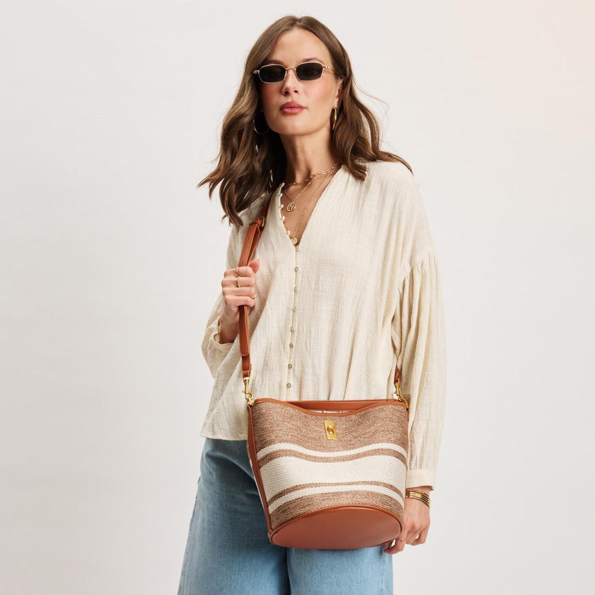 Woman wearing Tan Moda Luxe Mirella Bucket 842017141402 View 1 | Tan