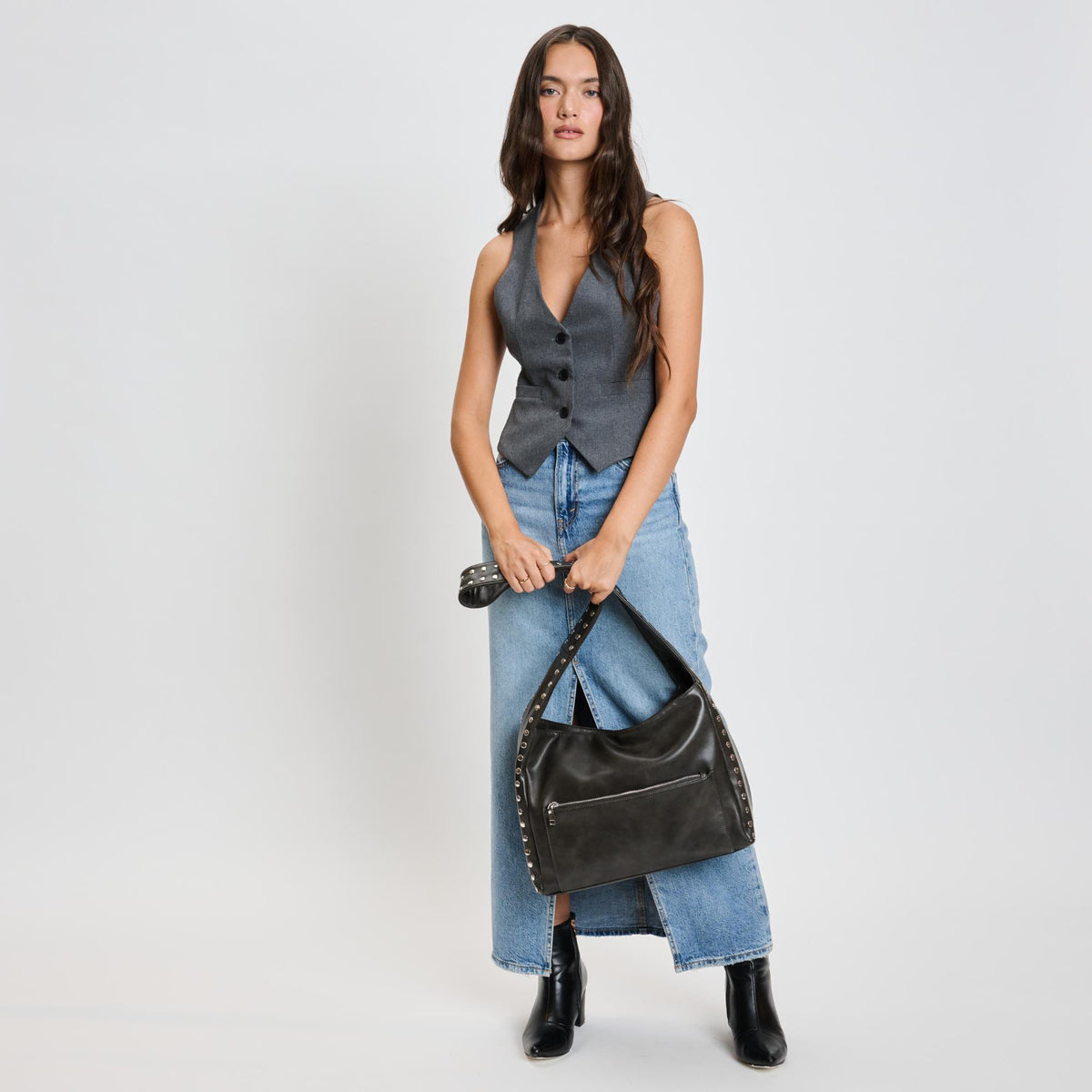 Woman wearing Gunmetal Moda Luxe Electra Crossbody 842017136170 View 4 | Gunmetal