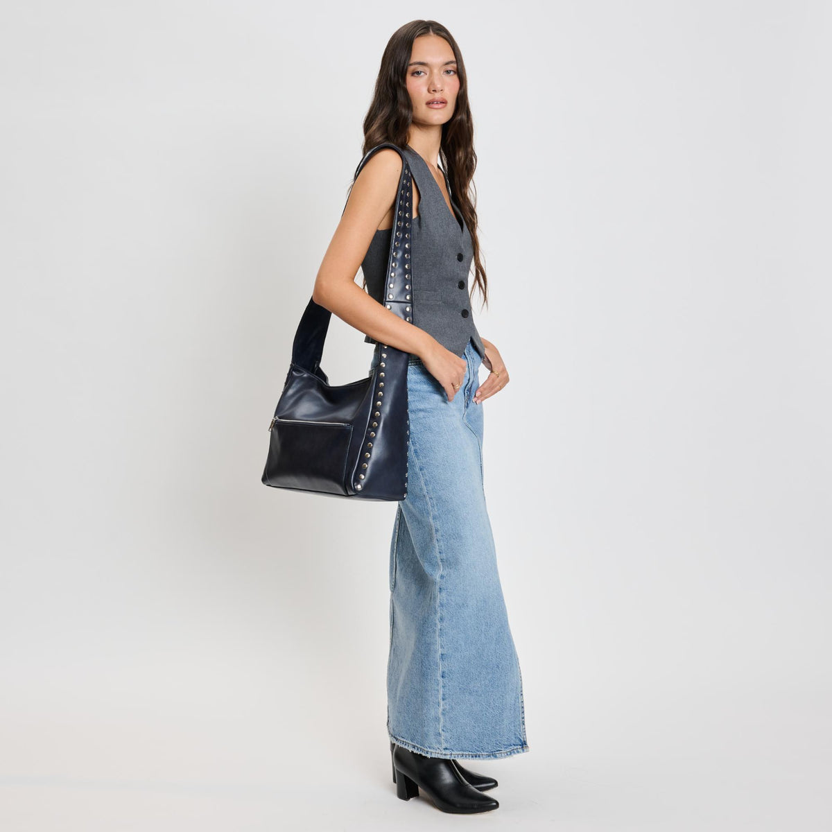 Woman wearing Navy Moda Luxe Electra Crossbody 842017136163 View 2 | Navy