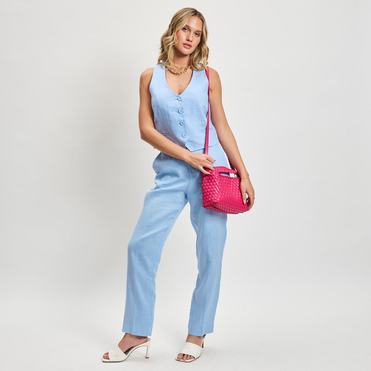 Woman wearing Fuchsia Moda Luxe Kaia Crossbody 842017137405 View 4 | Fuchsia