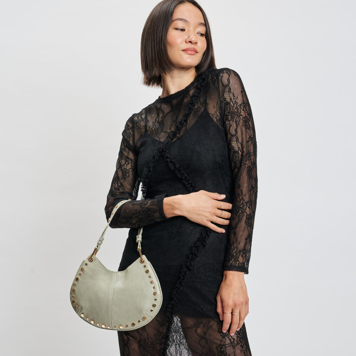 Woman wearing Sage Grey Sol and Selene Nova Crossbody 842017139652 View 1 | Sage Grey