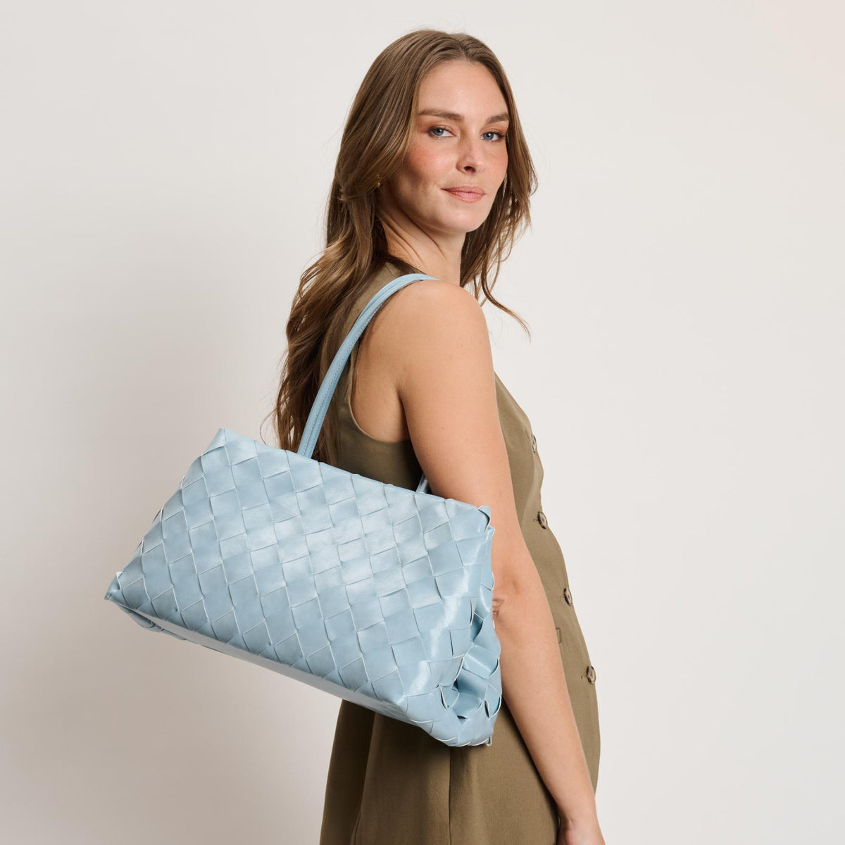 Woman wearing Blue Moda Luxe Elsy Satchel 842017140962 View 1 | Blue