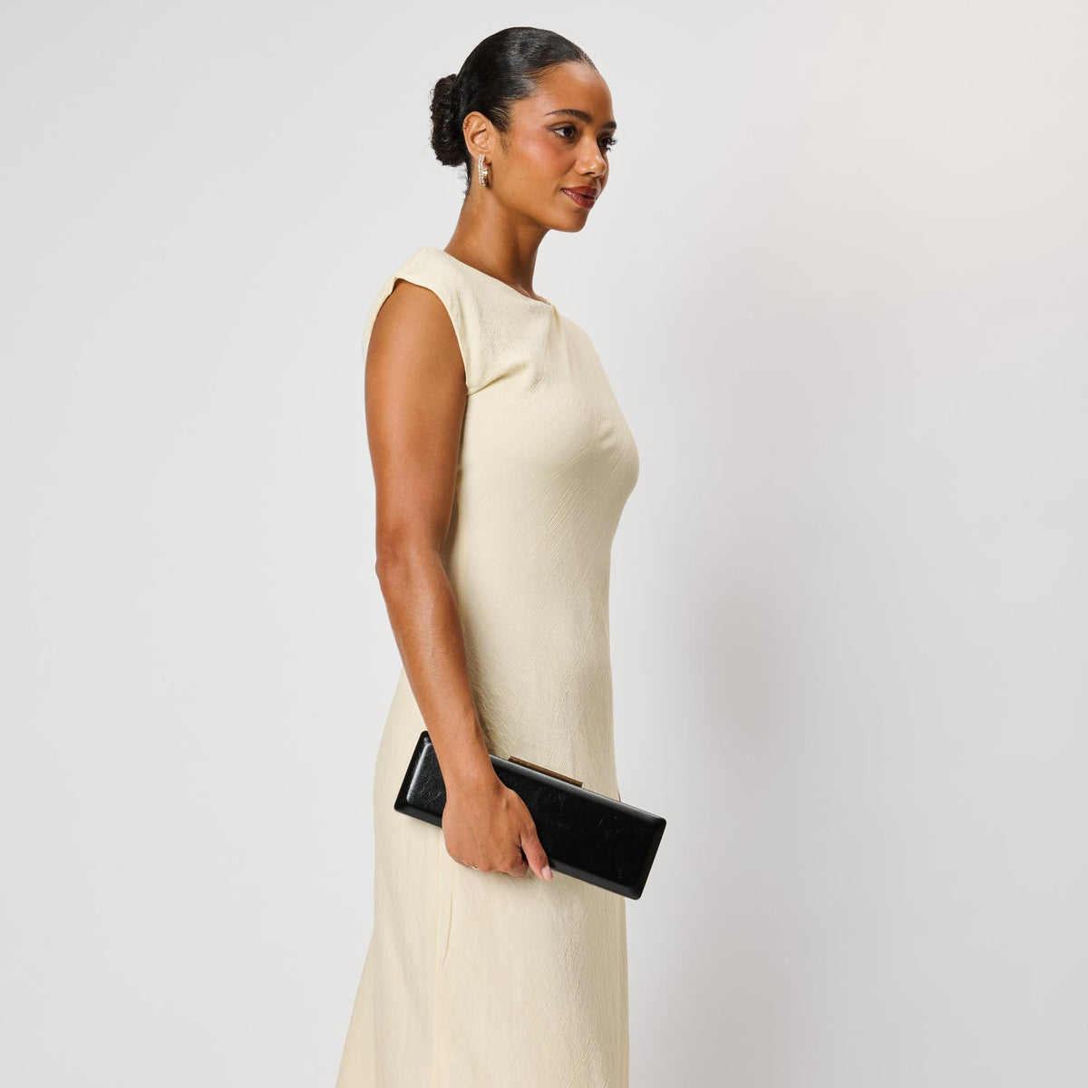 Woman wearing Black Moda Luxe Angie Clutch 842017142478 View 3 | Black