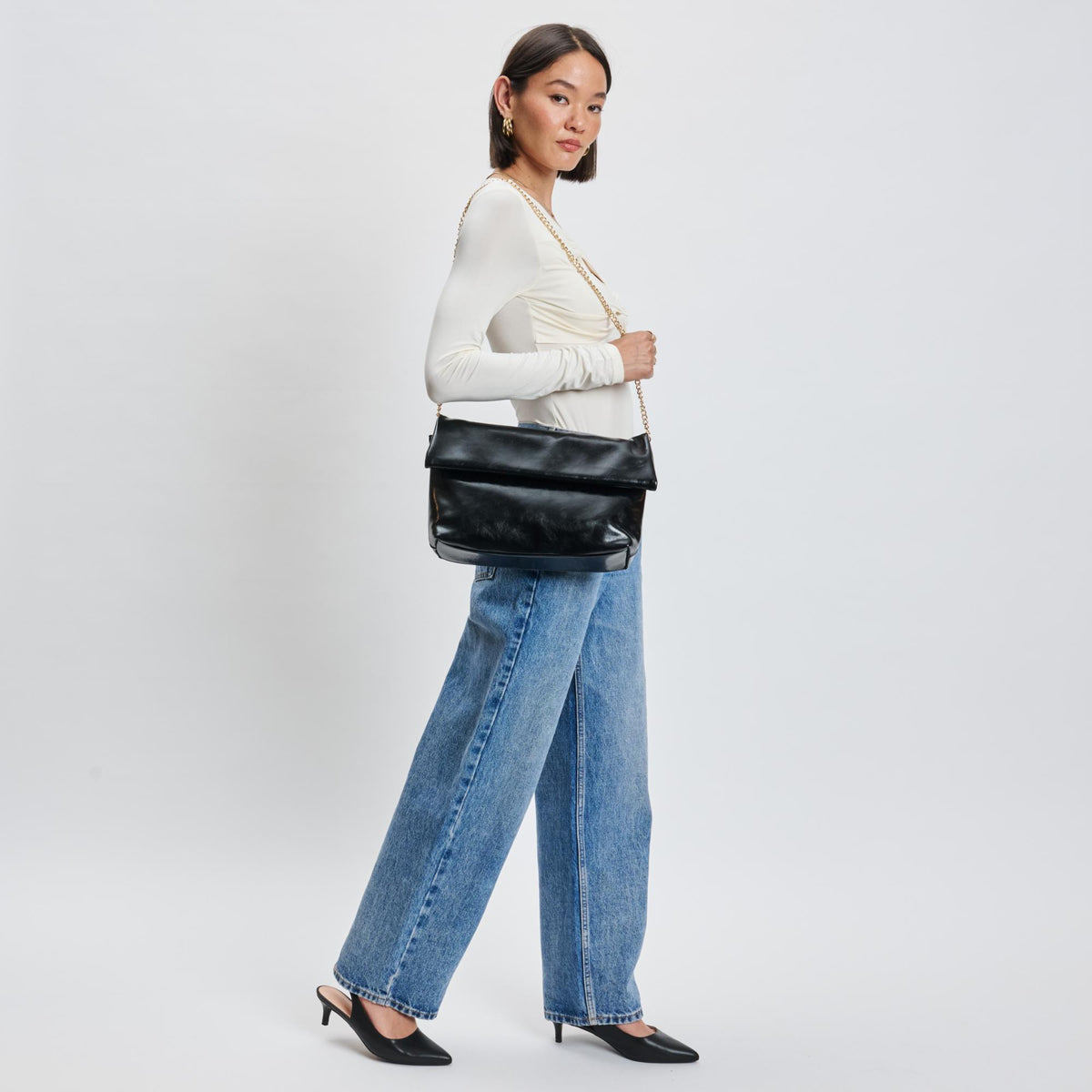 Woman wearing Black Moda Luxe Angela Crossbody 842017139973 View 3 | Black