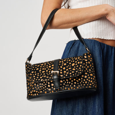 Woman wearing Black Tan Moda Luxe Urisa Shoulder Bag 842017142423 View 1 | Black Tan