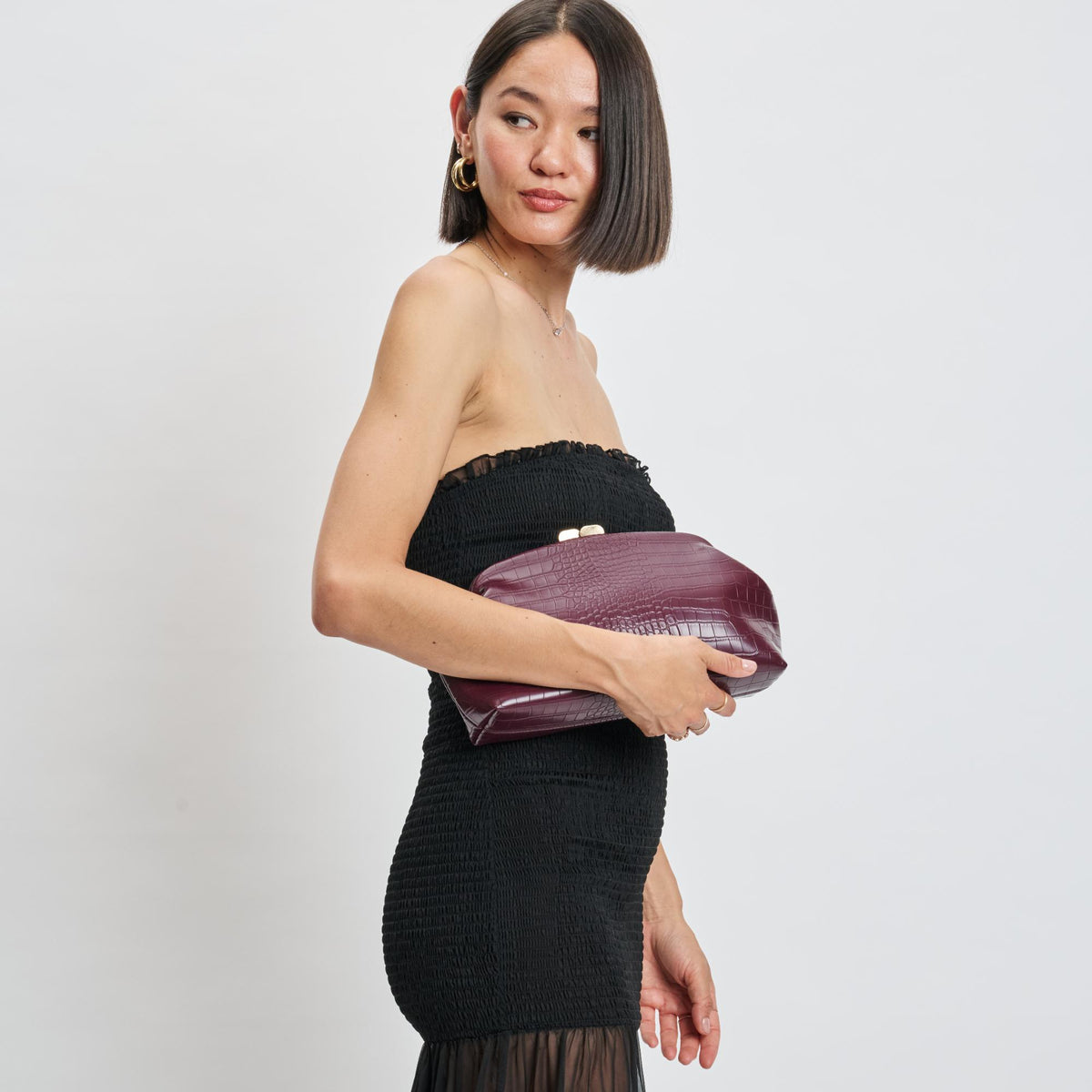 Woman wearing Burgundy Moda Luxe Camille Clutch 842017139188 View 3 | Burgundy