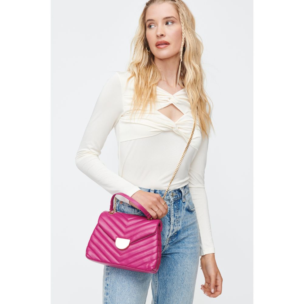 Woman wearing Fuchsia Sol and Selene Nora Crossbody 842017130499 View 4 | Fuchsia