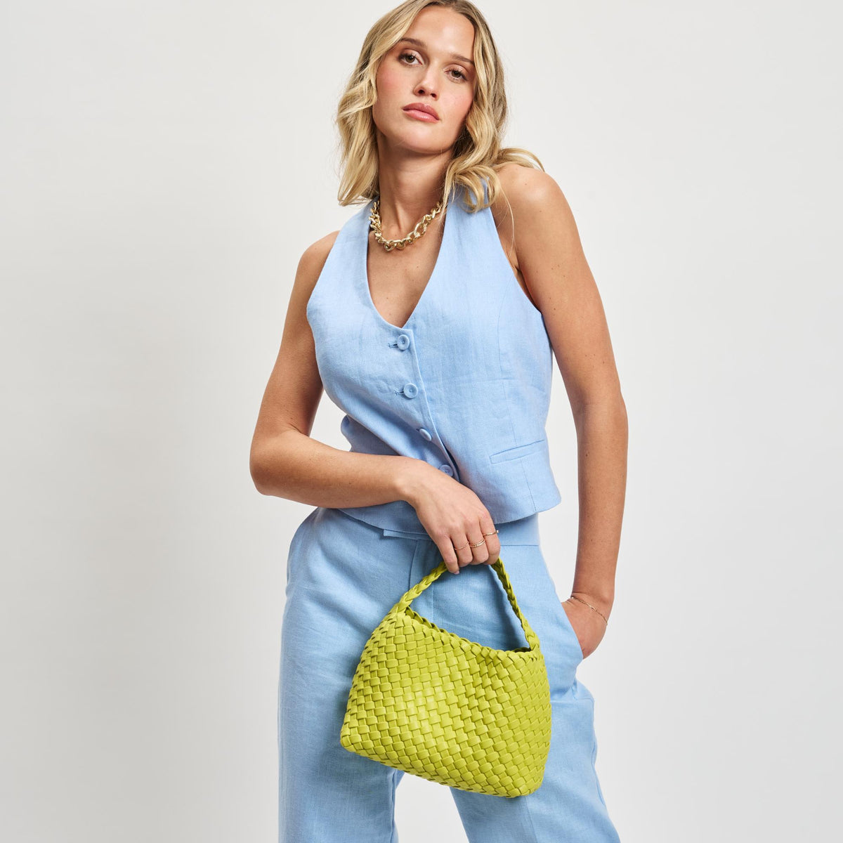 Woman wearing Lemon Moda Luxe Kaia Crossbody 842017137412 View 1 | Lemon