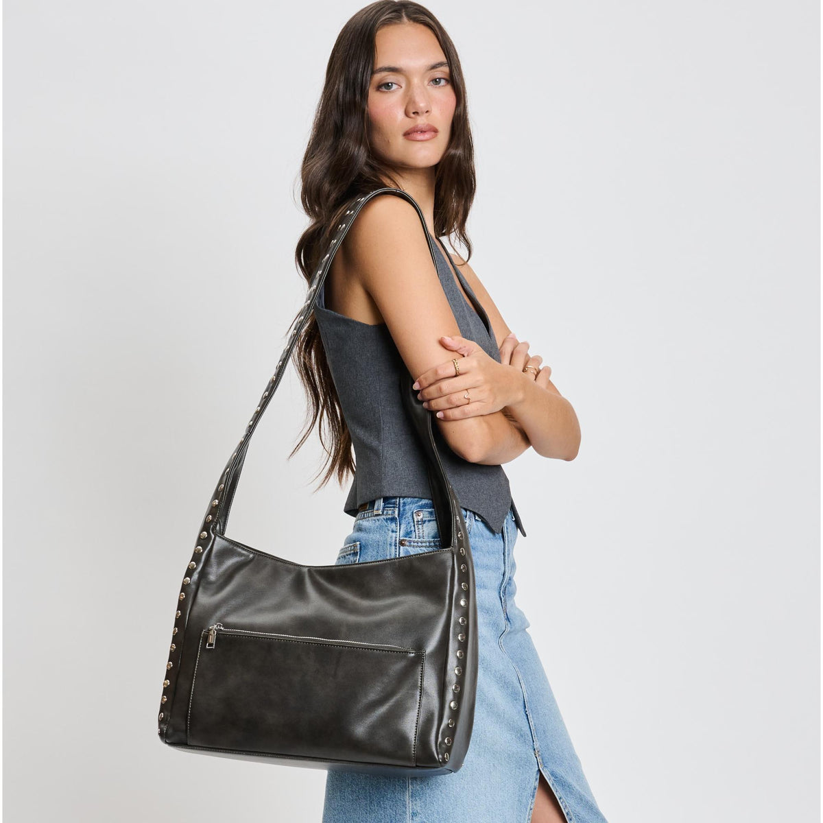 Woman wearing Gunmetal Moda Luxe Electra Crossbody 842017136170 View 1 | Gunmetal