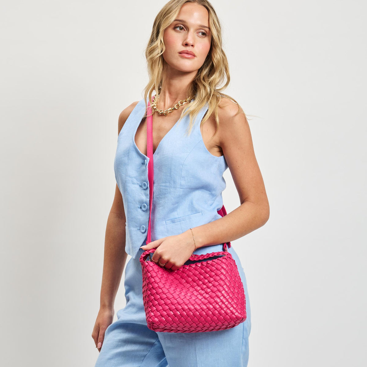 Woman wearing Fuchsia Sol and Selene Kaia Crossbody 842017137405 View 3 | Fuchsia