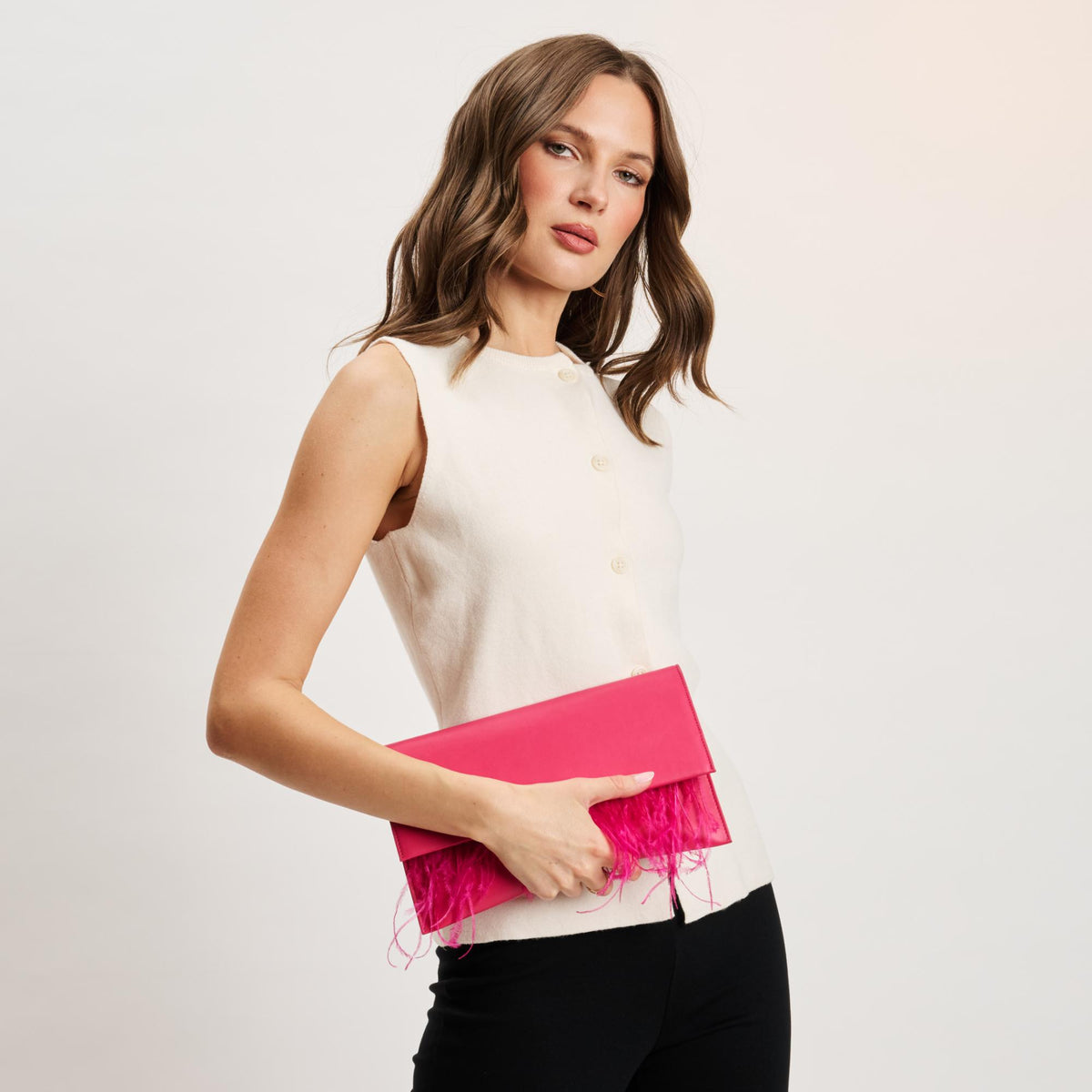Woman wearing Hot Pink Moda Luxe Everlee Clutch 842017131151 View 2 | Hot Pink