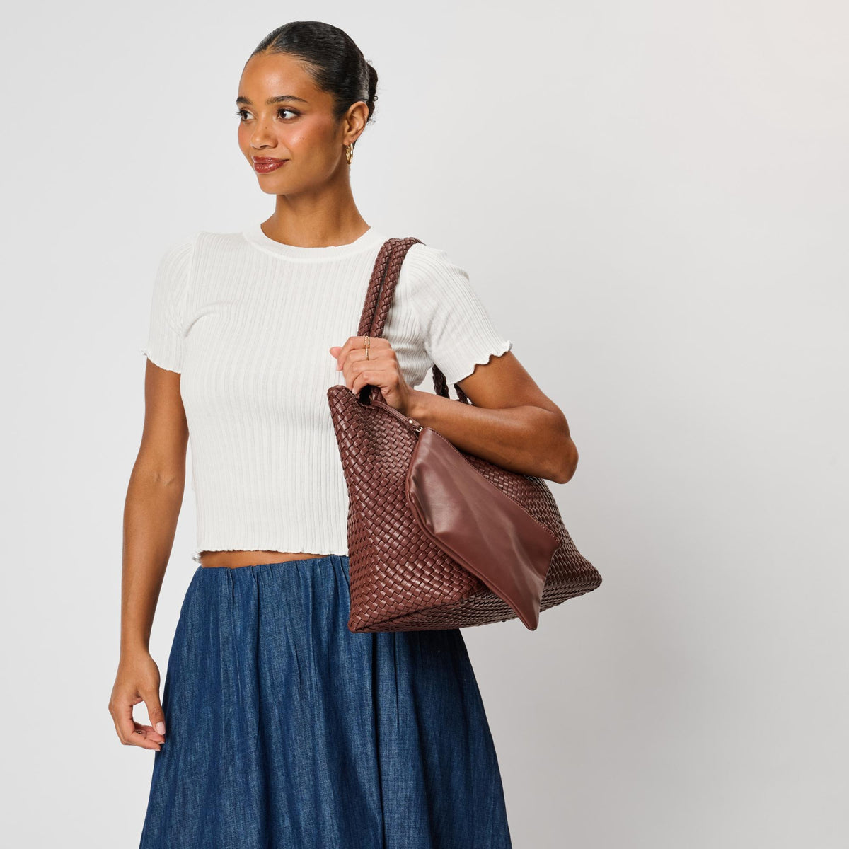 Woman wearing Chocolate Moda Luxe Solana Tote 842017142195 View 2 | Chocolate