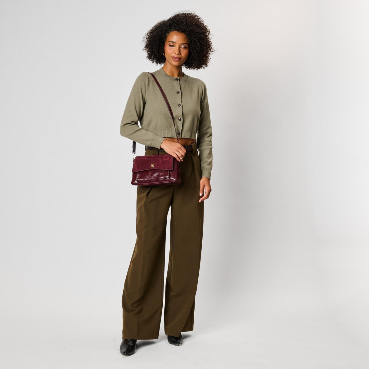 Woman wearing Burgundy Moda Luxe Aly Crossbody 842017143079 View 4 | Burgundy