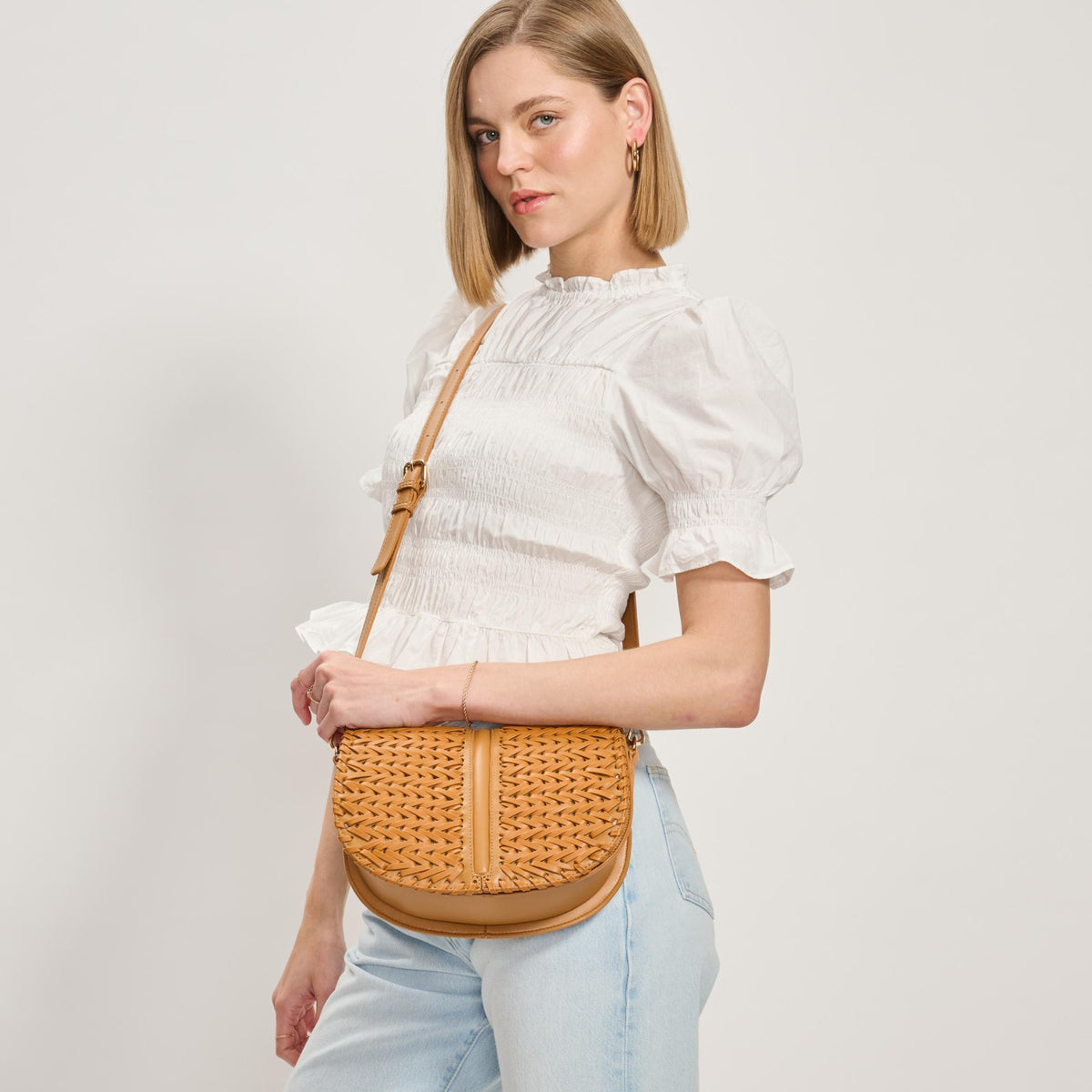 Woman wearing Tan Moda Luxe Cecillia Crossbody 842017137702 View 1 | Tan