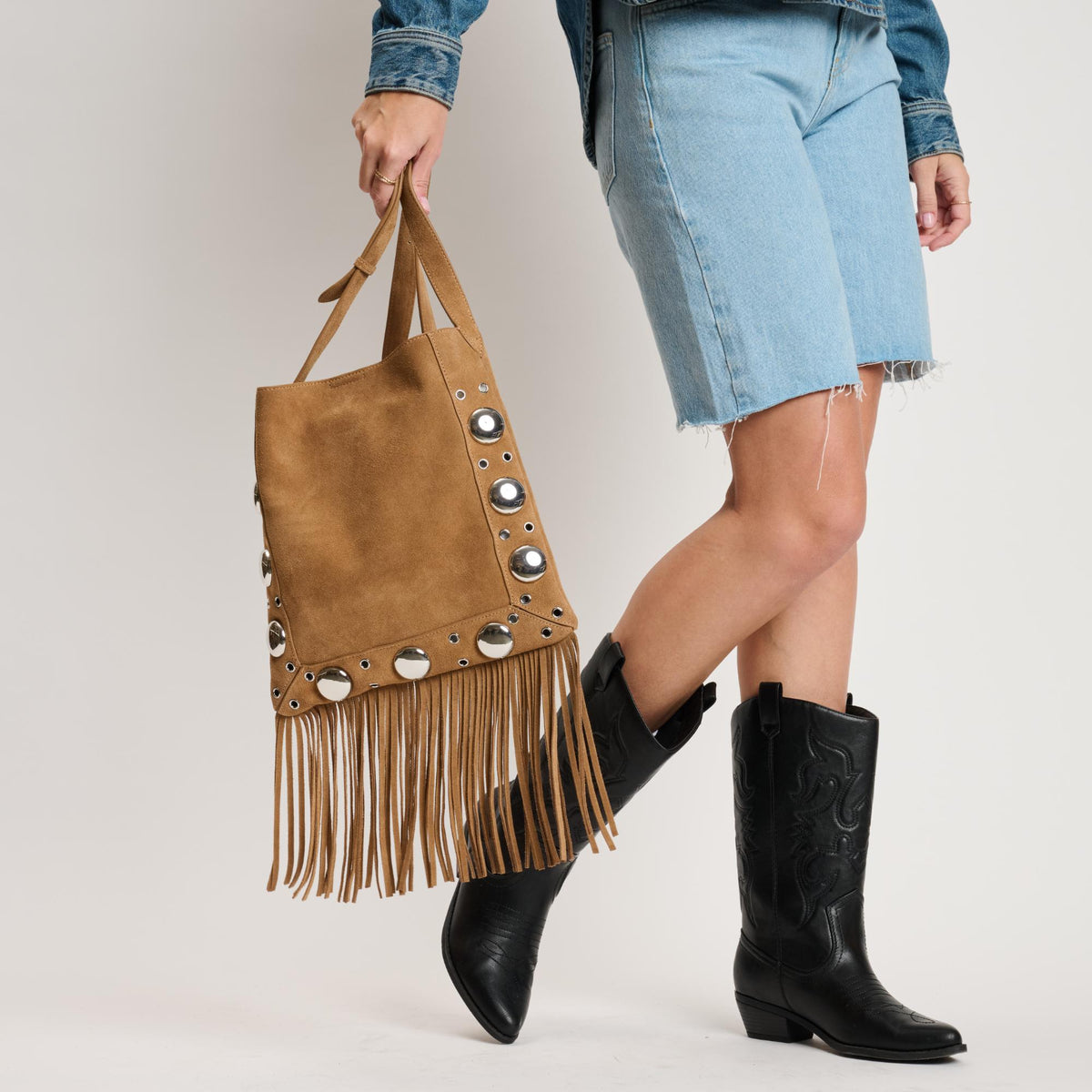 Woman wearing Cognac Moda Luxe Courtney Crossbody 842017140559 View 4 | Cognac