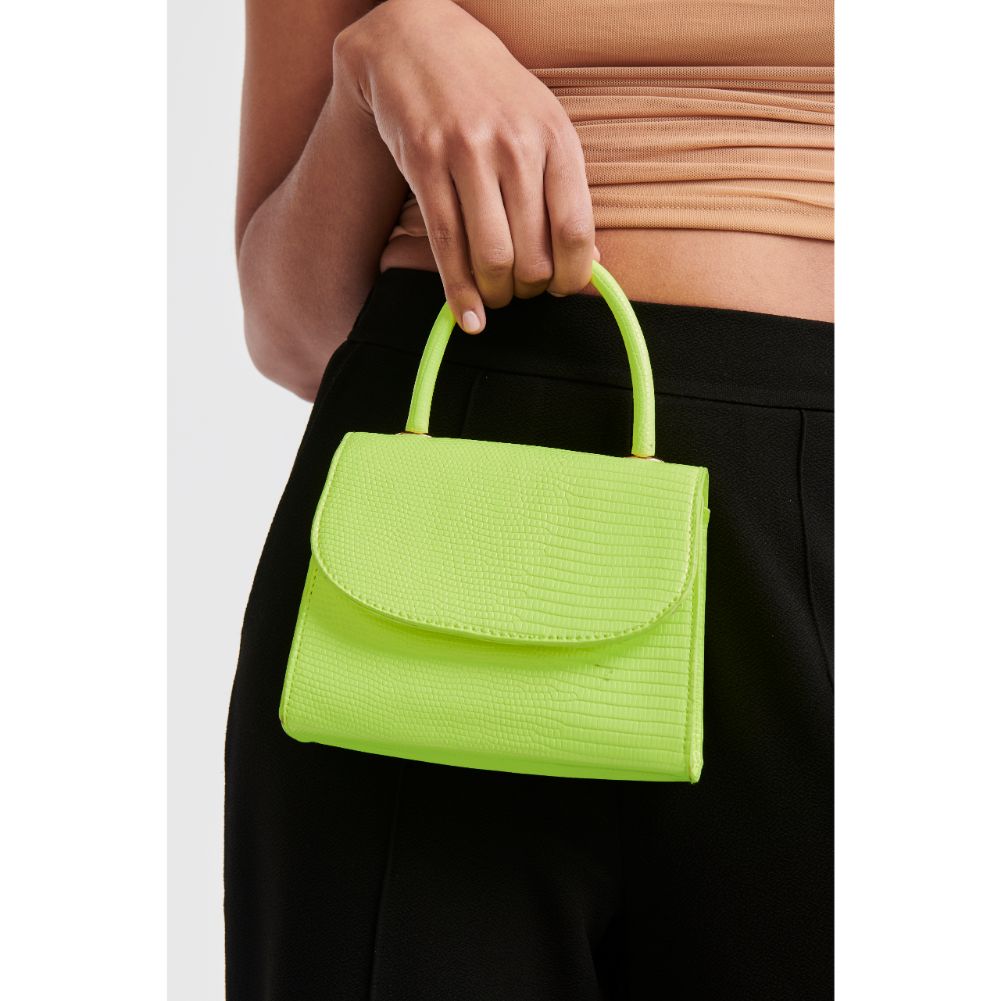 Woman wearing Neon Yellow Moda Luxe Talia Clutch 842017125662 View 2 | Neon Yellow