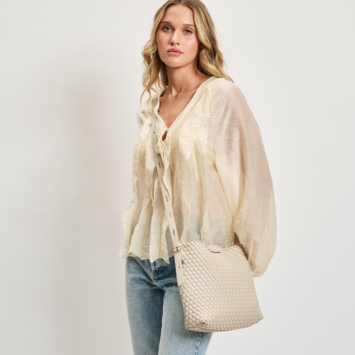 Woman wearing Ivory Sol and Selene Isadora Bucket 842017137337 View 1 | Ivory