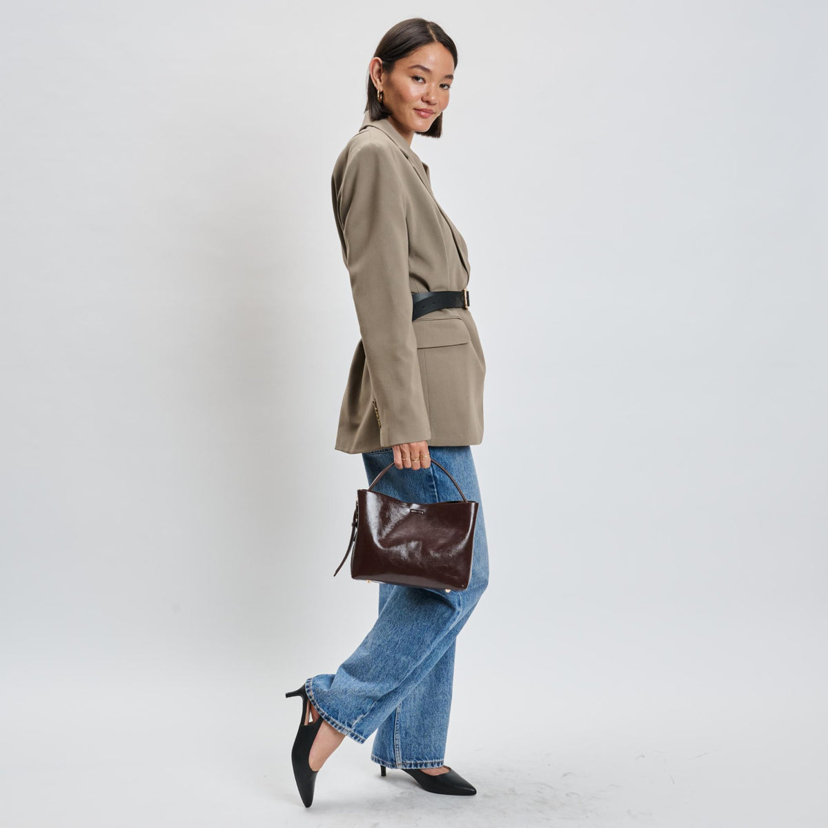 Woman wearing Chocolate Moda Luxe Sophie Crossbody 842017139508 View 3 | Chocolate