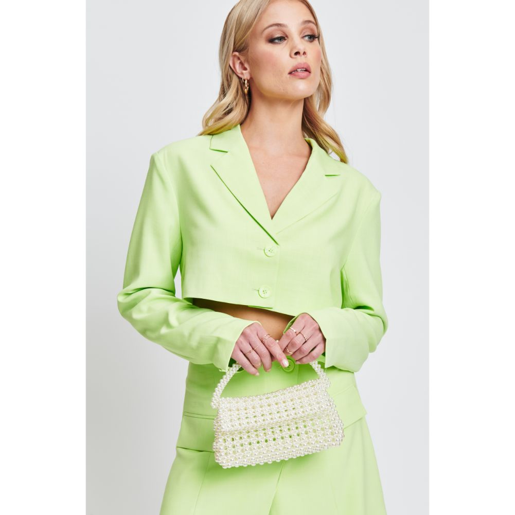 Woman wearing Ivory Sol and Selene Darcy Evening Bag 842017132646 View 2 | Ivory