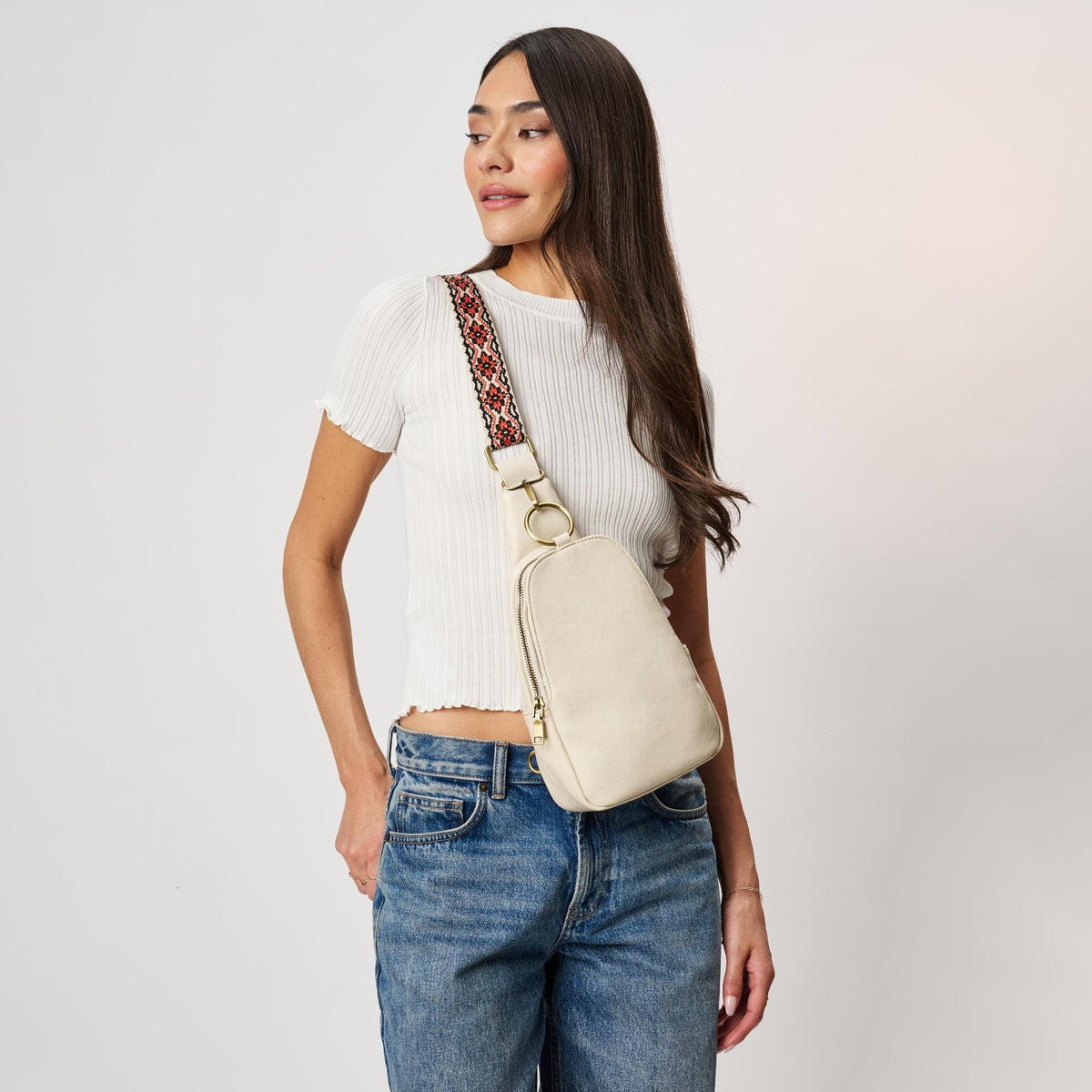 Woman wearing White Moda Luxe Regina Sling Backpack 842017142201 View 2 | White