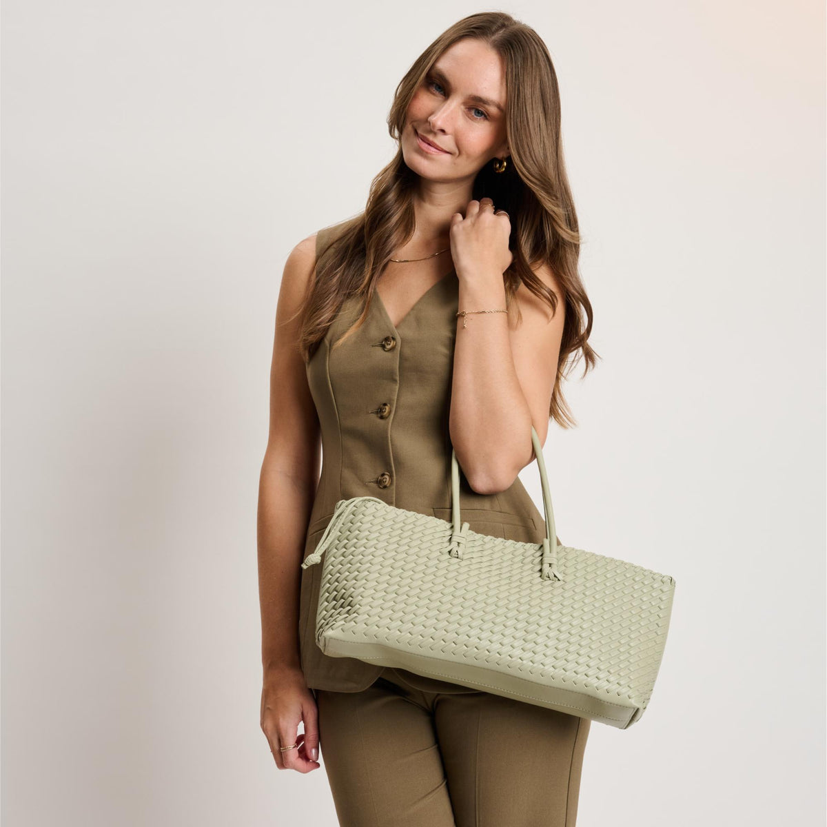 Woman wearing Sage Moda Luxe Nola Tote 842017140894 View 2 | Sage