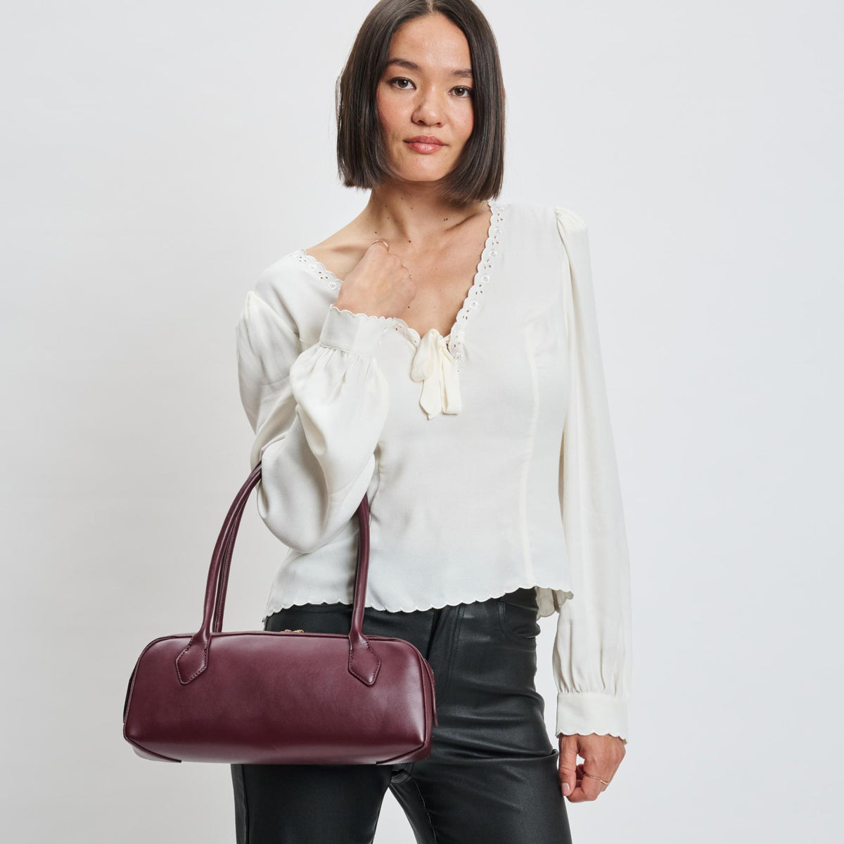 Woman wearing Wine Moda Luxe Betty Shoulder Bag 842017139416 View 2 | Wine