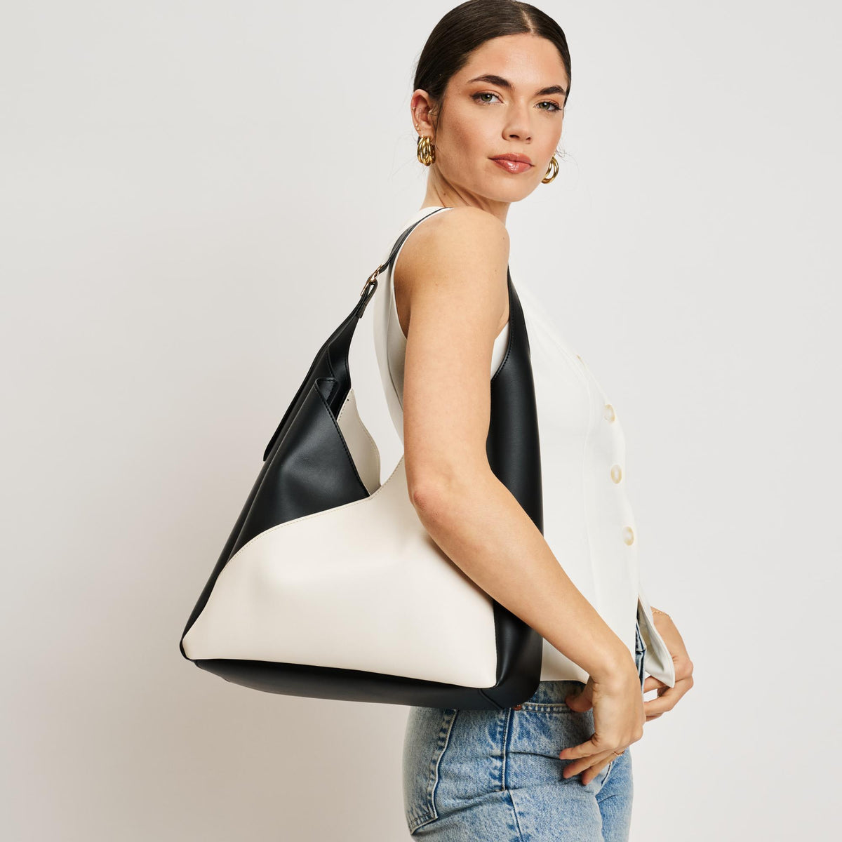 Woman wearing Ivory Black Sol and Selene Frankie Hobo 842017138518 View 2 | Ivory Black